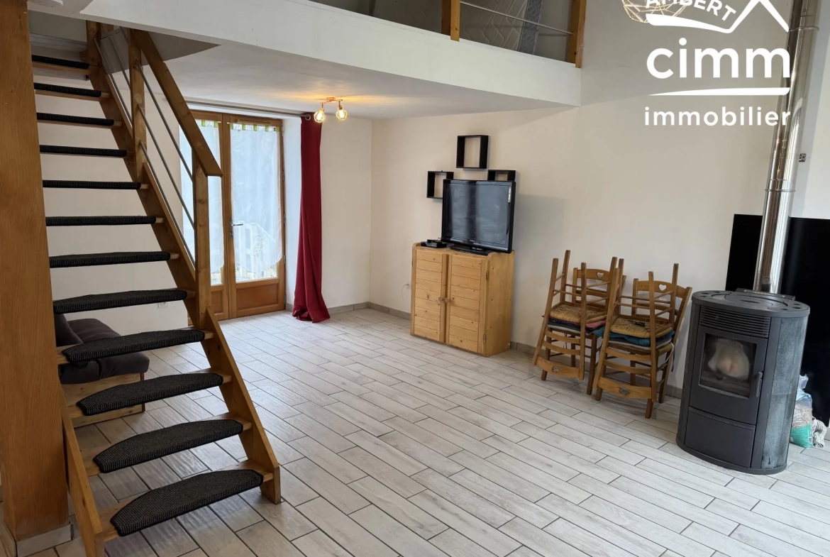 Achat ensemble de deux maisons mitoyennes à Ambert avec garages et jardin, idéal investisseur 