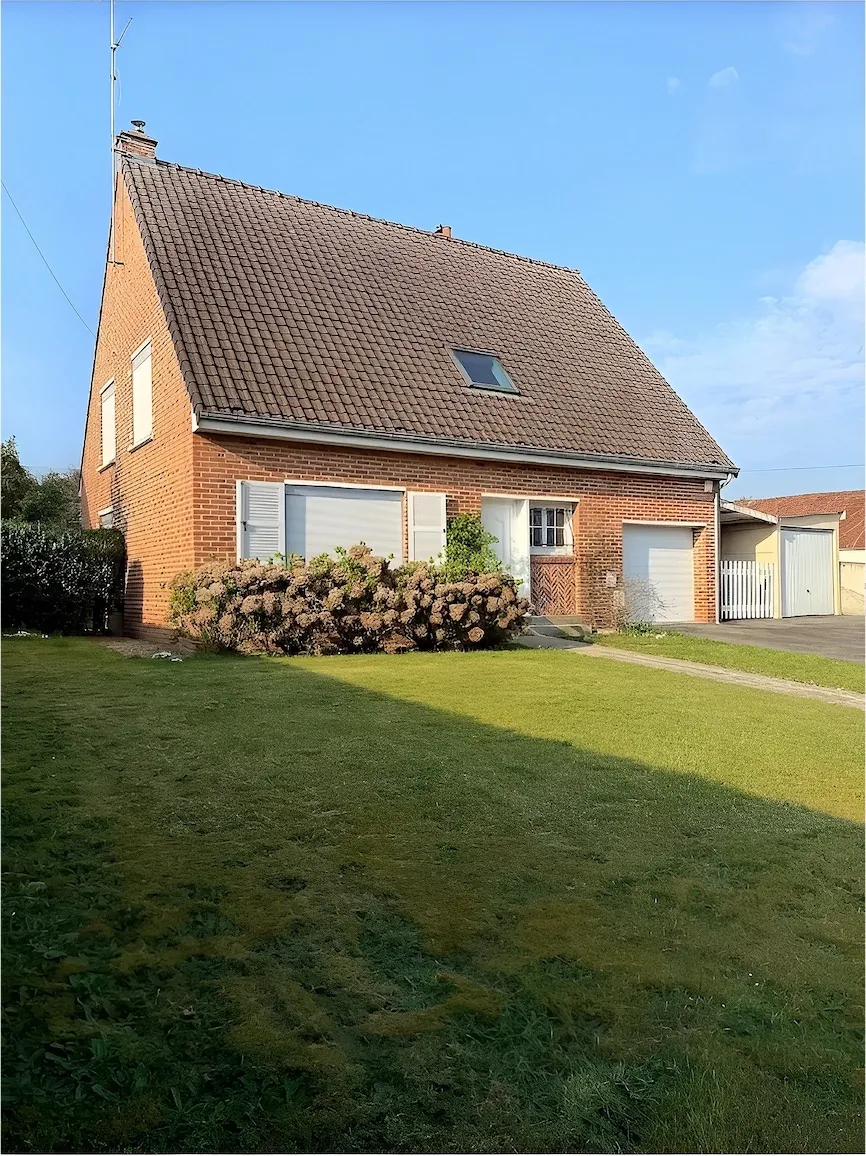 Charmante maison familiale à vendre à Maubeuge, proche centre avec garage et jardin 