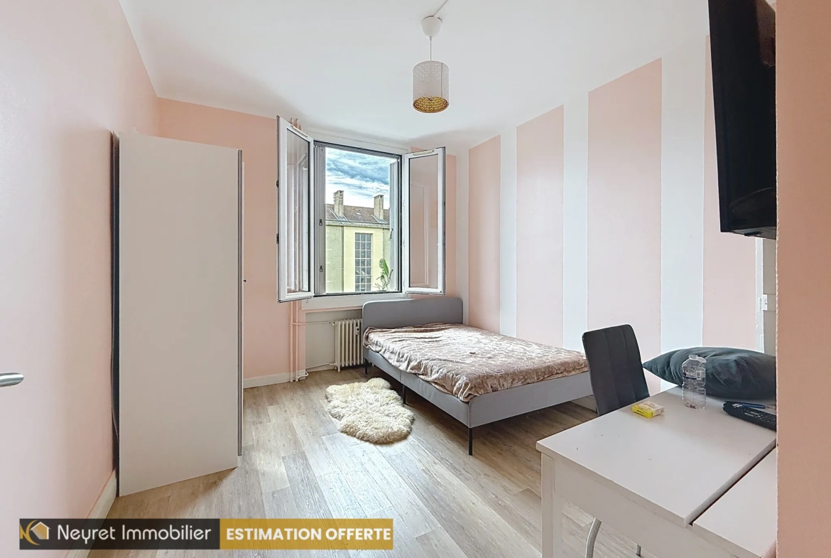 Appartement T4 à Saint-Étienne Montplaisir avec balcon et cave 