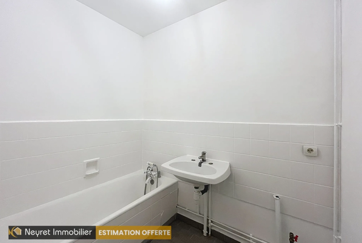 Vente appartement T3 de 64 m² à Oullins, proche du métro B, avec cave et parking 