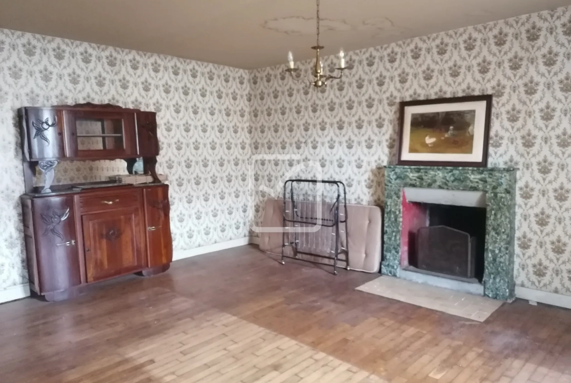 Maison à Saint Malo des trois fontaines de 108 m² avec jardin et potentiel de rénovation 