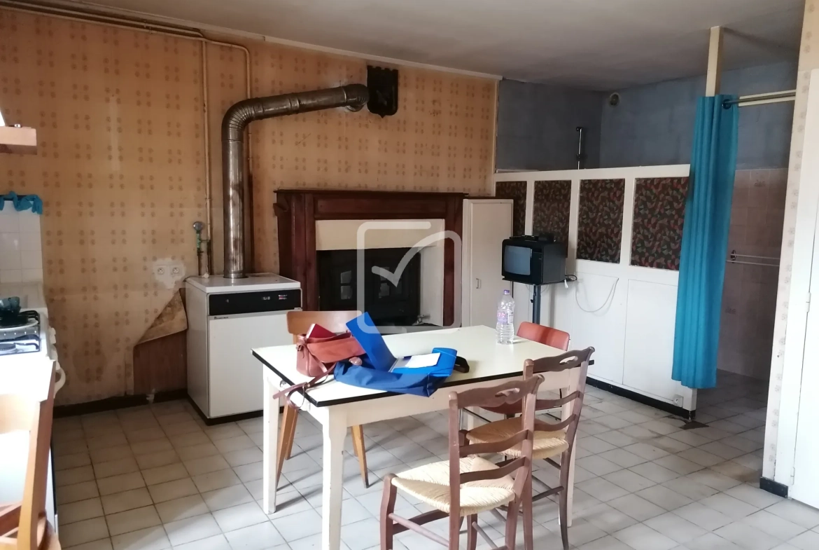Maison à Saint Malo des trois fontaines de 108 m² avec jardin et potentiel de rénovation 