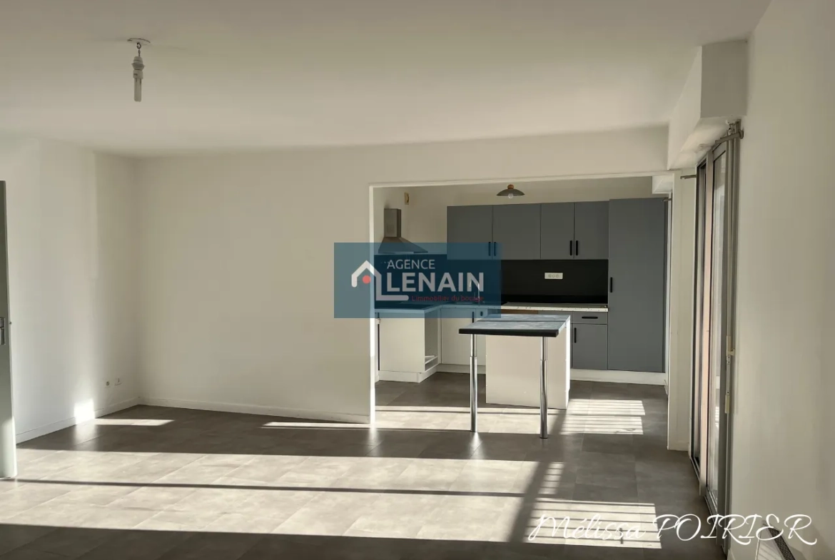 Appartement 4 Pièces avec Balcon, Parking et Cave à Cholet 