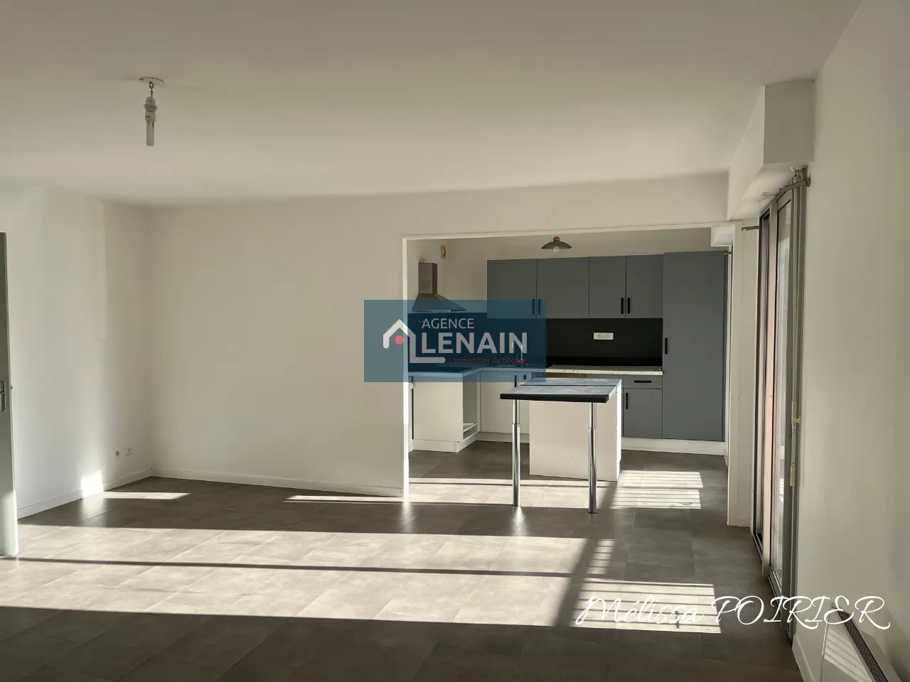 Appartement 4 Pièces avec Balcon, Parking et Cave à Cholet 