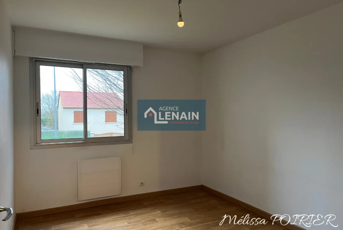 Appartement 4 Pièces avec Balcon, Parking et Cave à Cholet 
