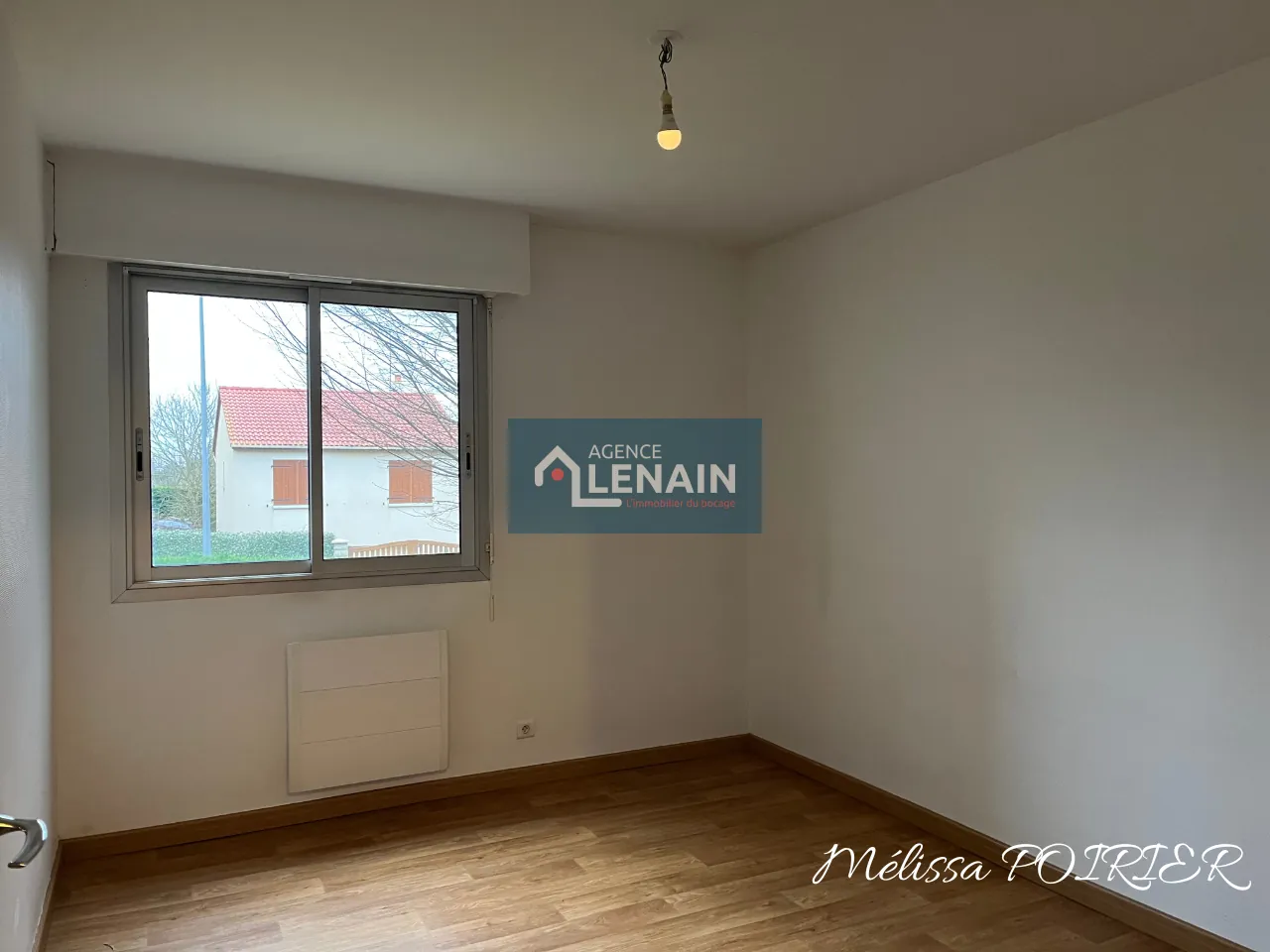 Appartement 4 Pièces avec Balcon, Parking et Cave à Cholet 