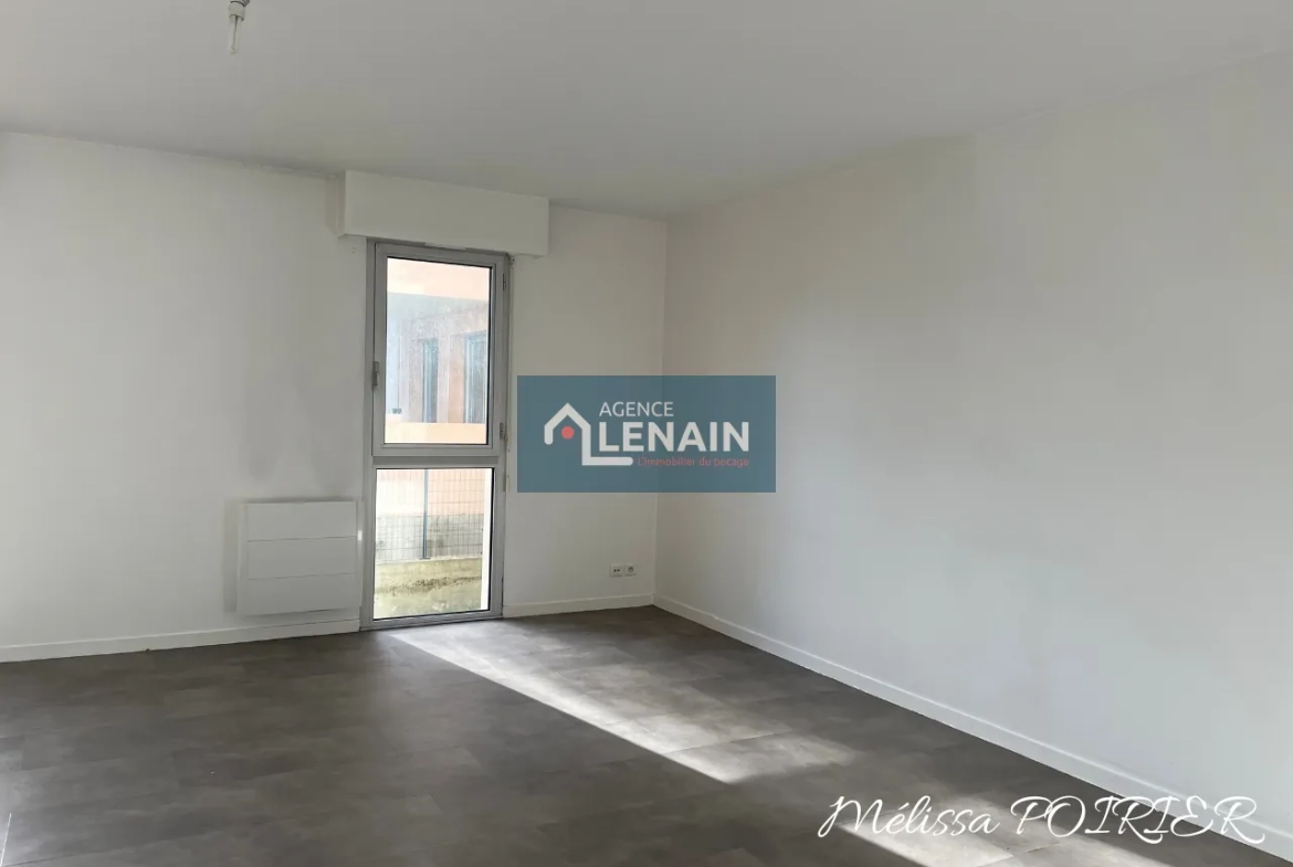 Appartement 4 Pièces avec Balcon, Parking et Cave à Cholet 