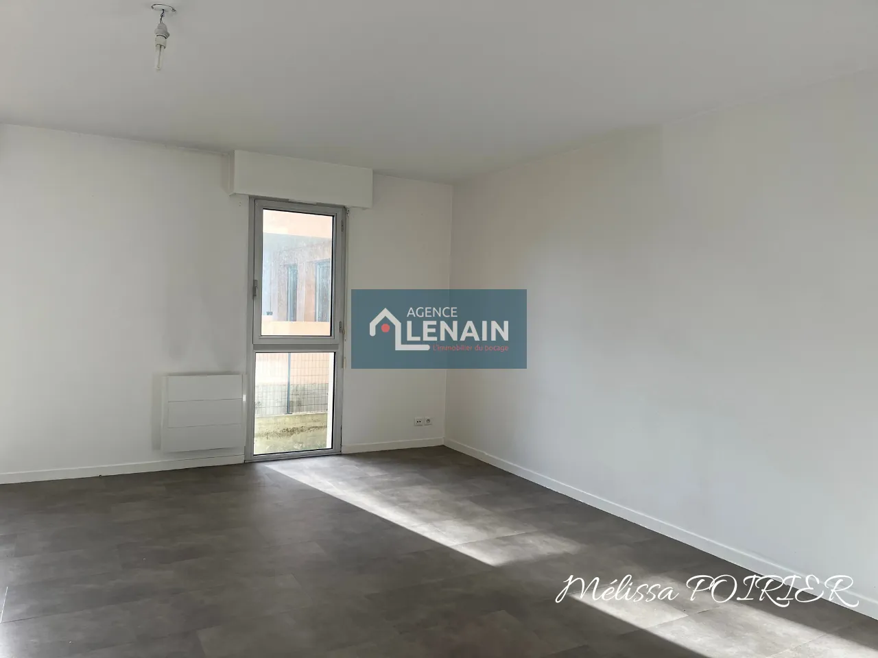 Appartement 4 Pièces avec Balcon, Parking et Cave à Cholet 