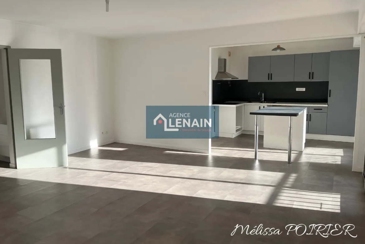 Appartement 4 Pièces avec Balcon, Parking et Cave à Cholet 