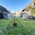 Maison ancienne avec grand terrain et garage à Auneau - Opportunité à saisir