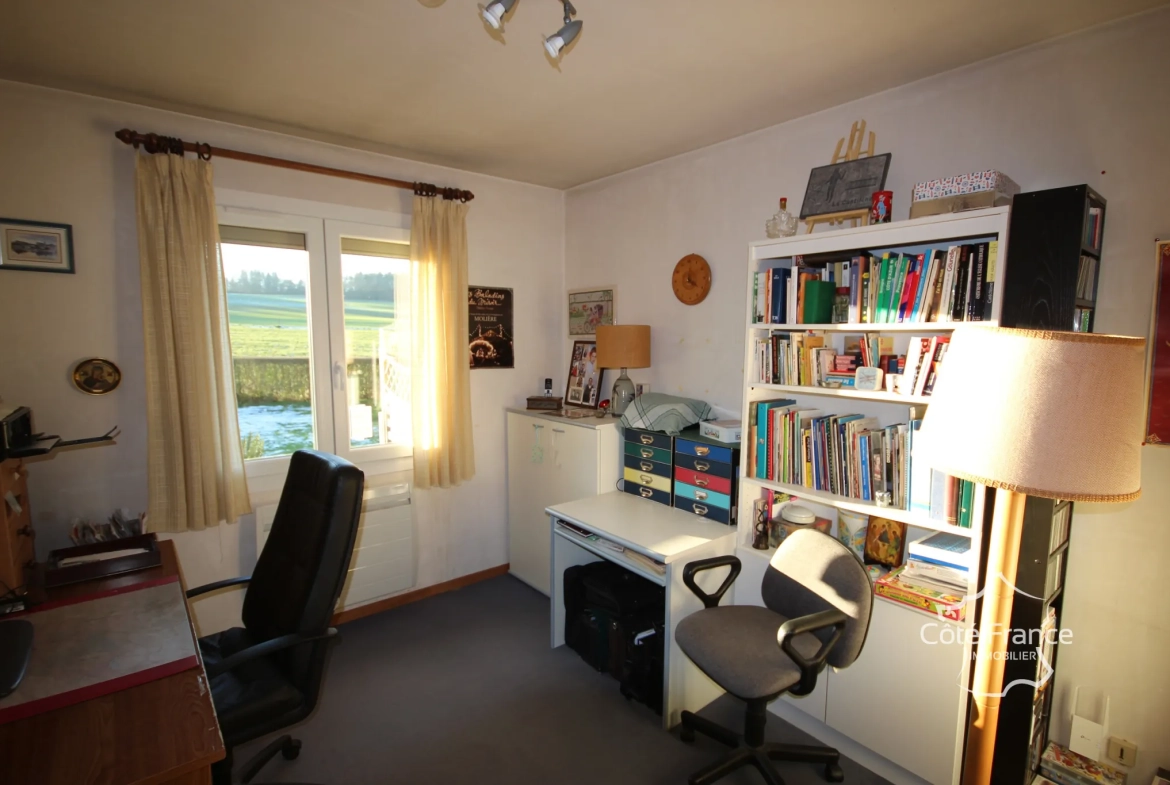 Maison familiale de plain-pied avec terrain proche de la nature à Rancennes 