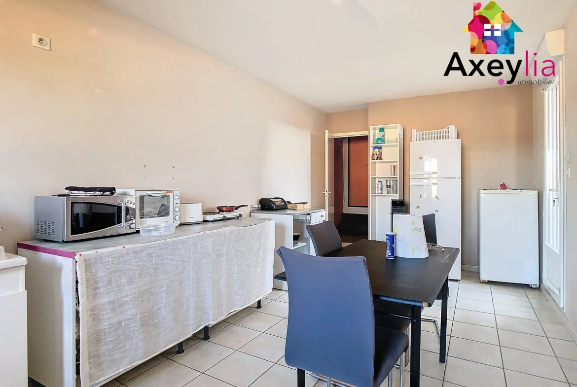 Immeuble à vendre à Digoin avec local commercial et appartement loué 