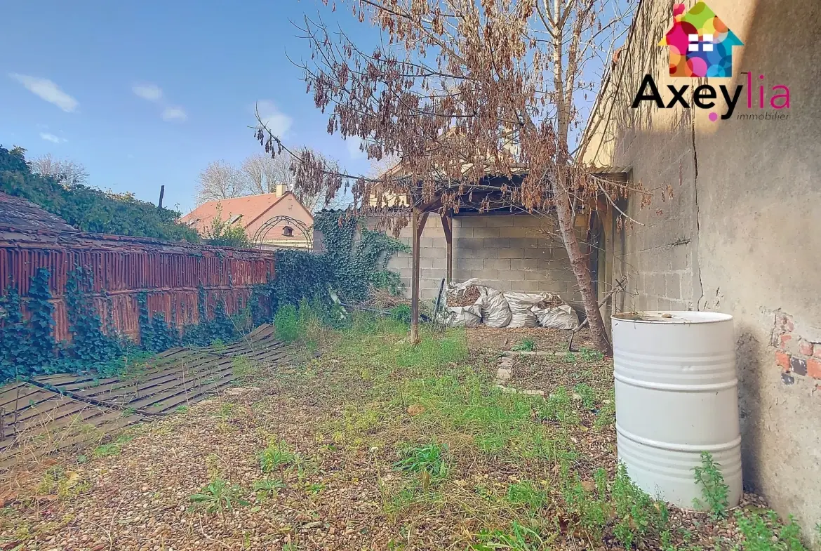 Immeuble à vendre à Digoin avec local commercial et appartement loué 