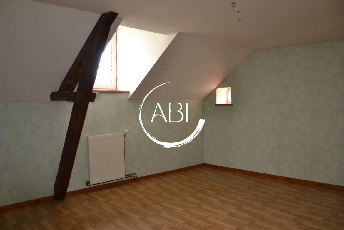 Maison en pierre à vendre proche Bagnoles de l'Orne - 88 m² avec terrain et garage 