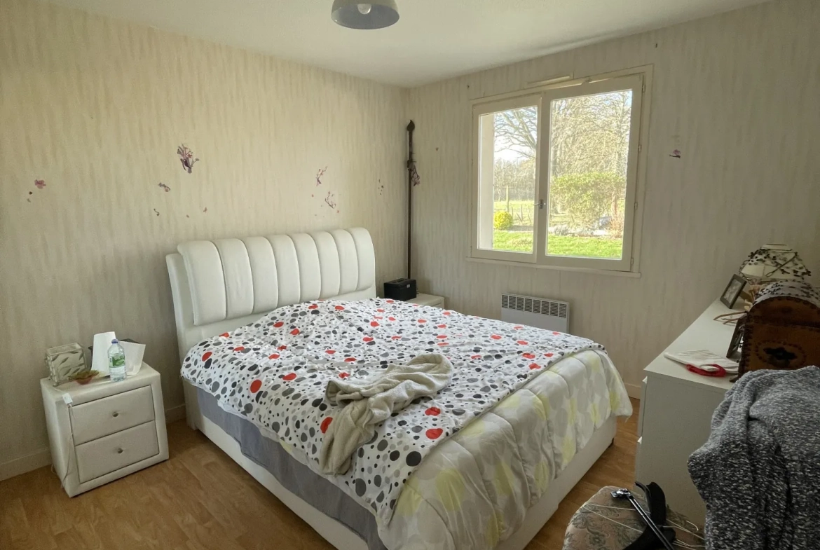 Maison à vendre à Orléat avec jardin clos et garage aménageable 