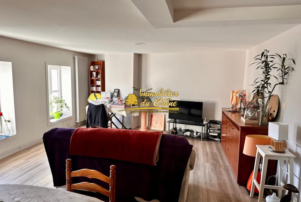 Spacieux appartement de 87 m² avec 2 chambres, cave et parking proche centre de Remiremont 