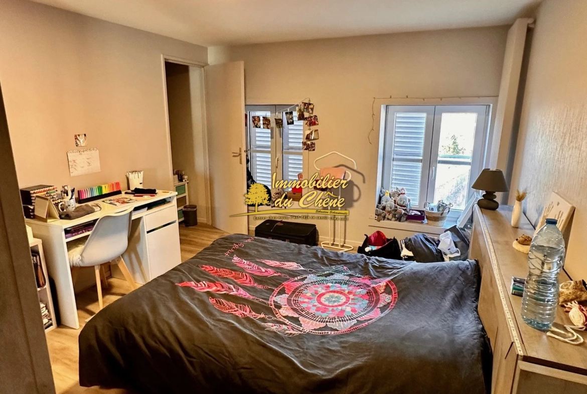 Spacieux appartement de 87 m² avec 2 chambres, cave et parking proche centre de Remiremont 