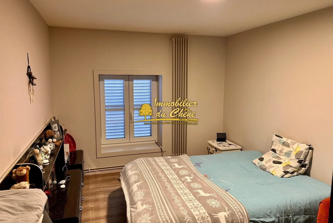 Spacieux appartement de 87 m² avec 2 chambres, cave et parking proche centre de Remiremont 