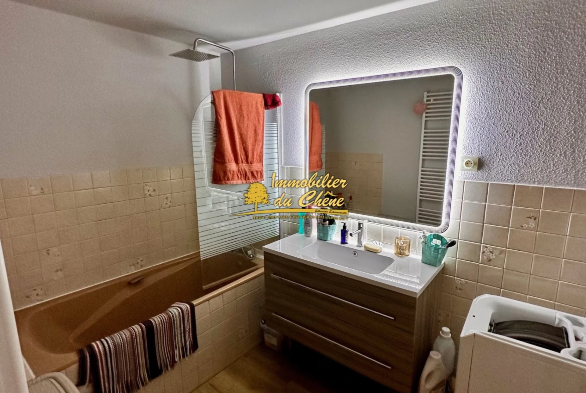 Spacieux appartement de 87 m² avec 2 chambres, cave et parking proche centre de Remiremont 