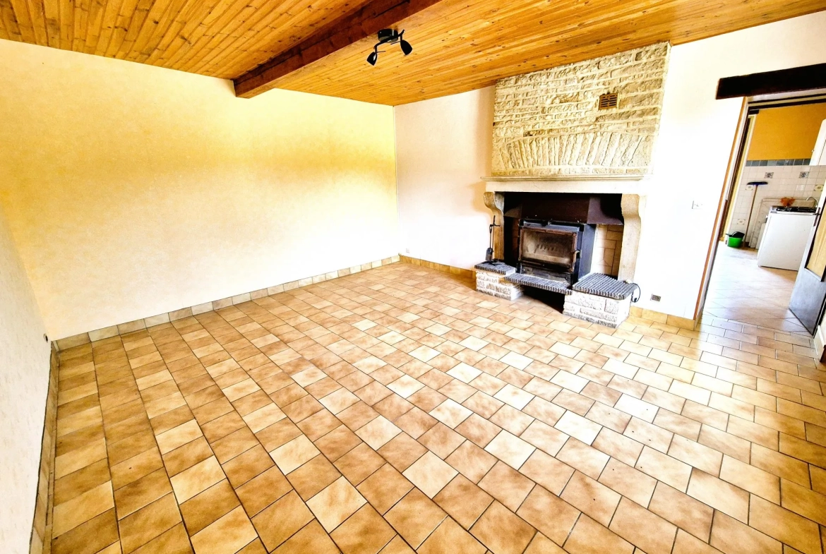Charmante maison en pierre avec terrasse et potentiel locatif à Cunfin 
