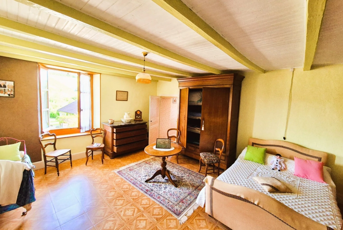 Charmante maison en pierre avec terrasse et potentiel locatif à Cunfin 