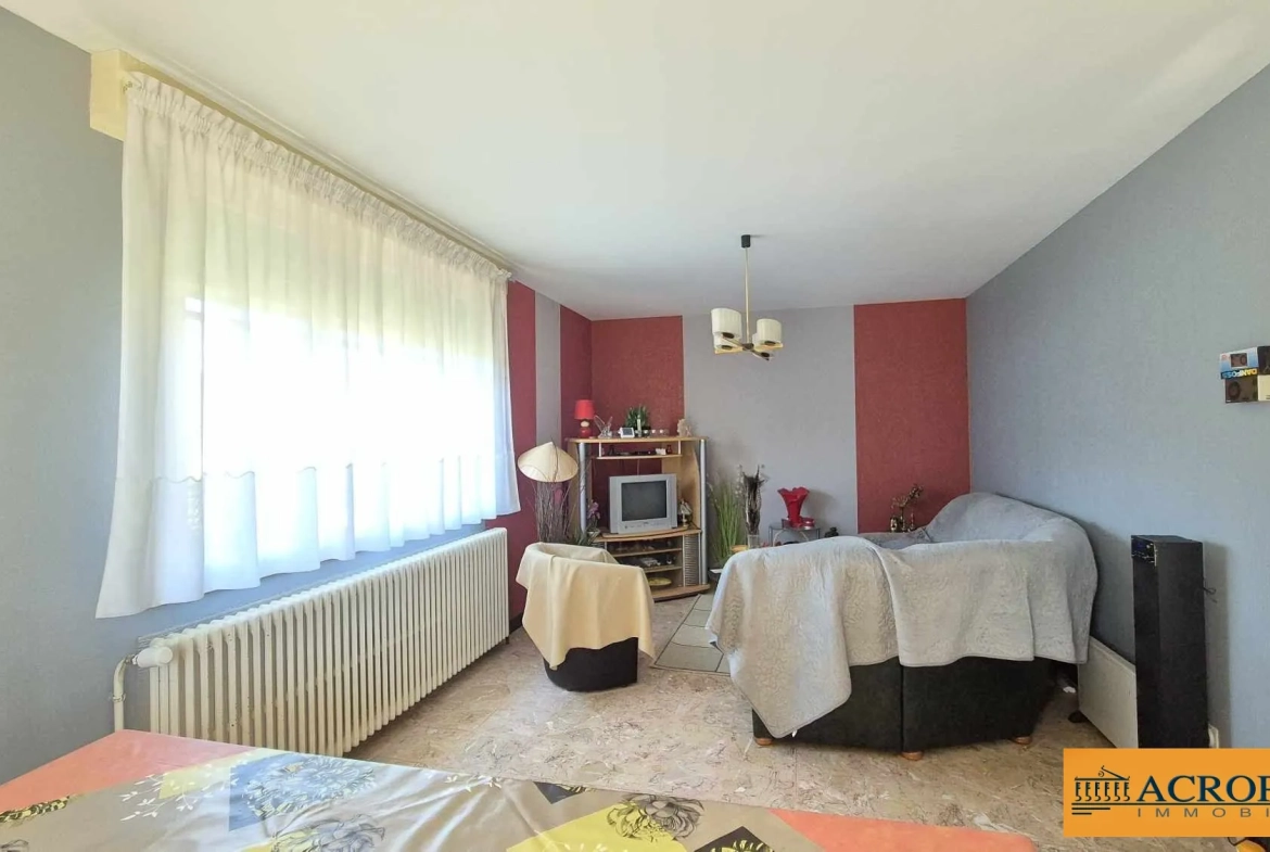 Maison de 100 m² avec sous-sol, garage et balcon à Argent-sur-Sauldre 