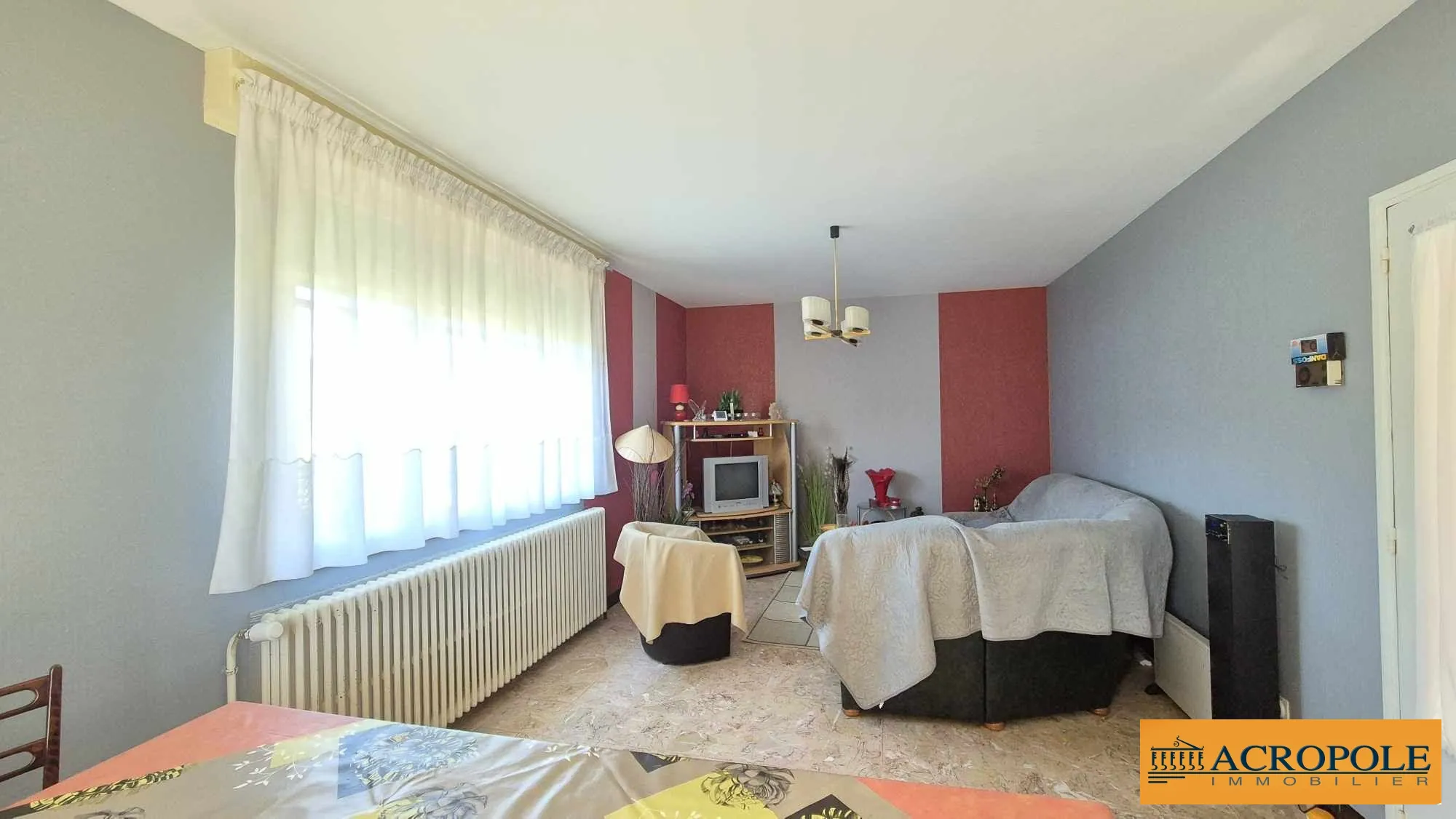 Maison de 100 m² avec sous-sol, garage et balcon à Argent-sur-Sauldre 