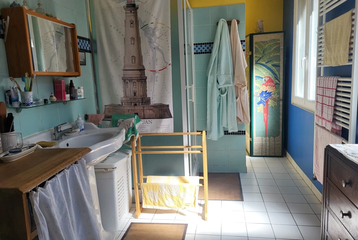 Charmante maison de ville à Saintes avec jardin et garage - Opportunité à saisir 