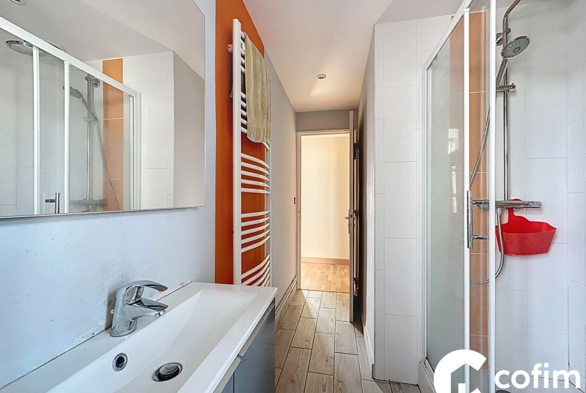 Appartement T4 à Jurançon avec balcon, cave et garage, idéalement situé 