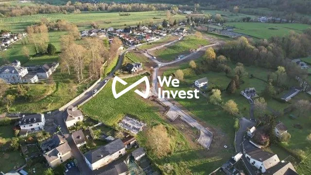 Terrain constructible de 700 m² à vendre à Arudy - Vue imprenable et proximité des commodités 
