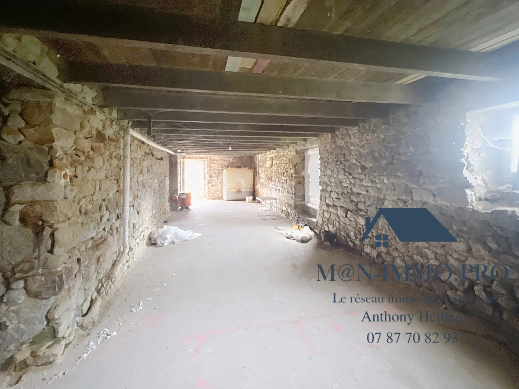 Maison en pierre à Plessala - 146 m² à rénover avec atelier et potentiel d'aménagement 