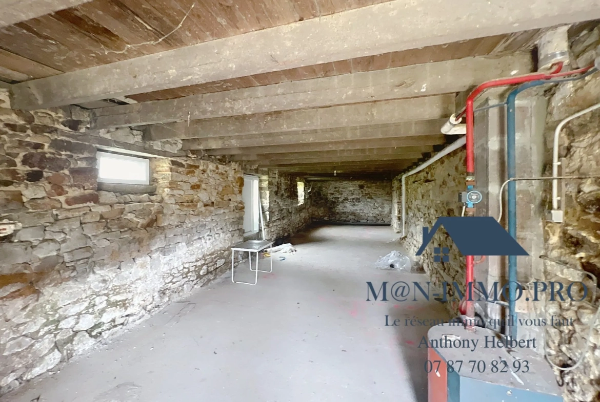 Maison en pierre à Plessala - 146 m² à rénover avec atelier et potentiel d'aménagement 