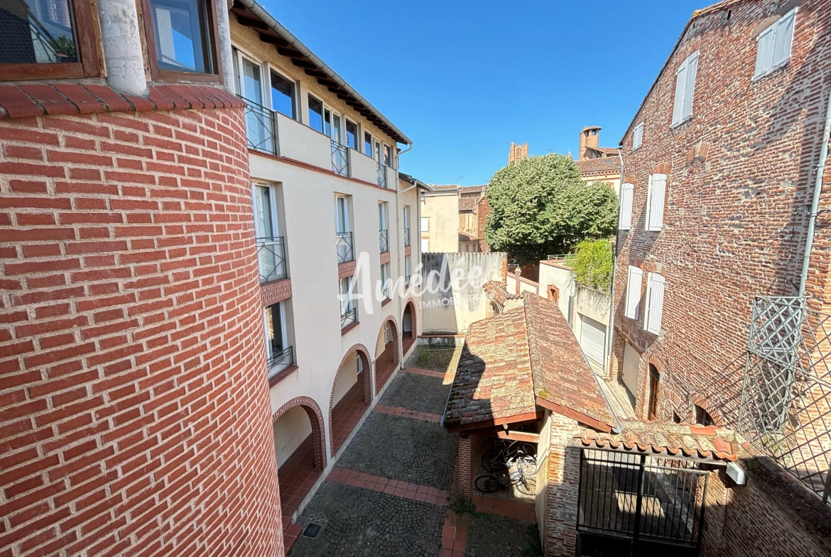 Appartement 2 pièces à vendre au centre-ville d'Albi avec charme et confort 