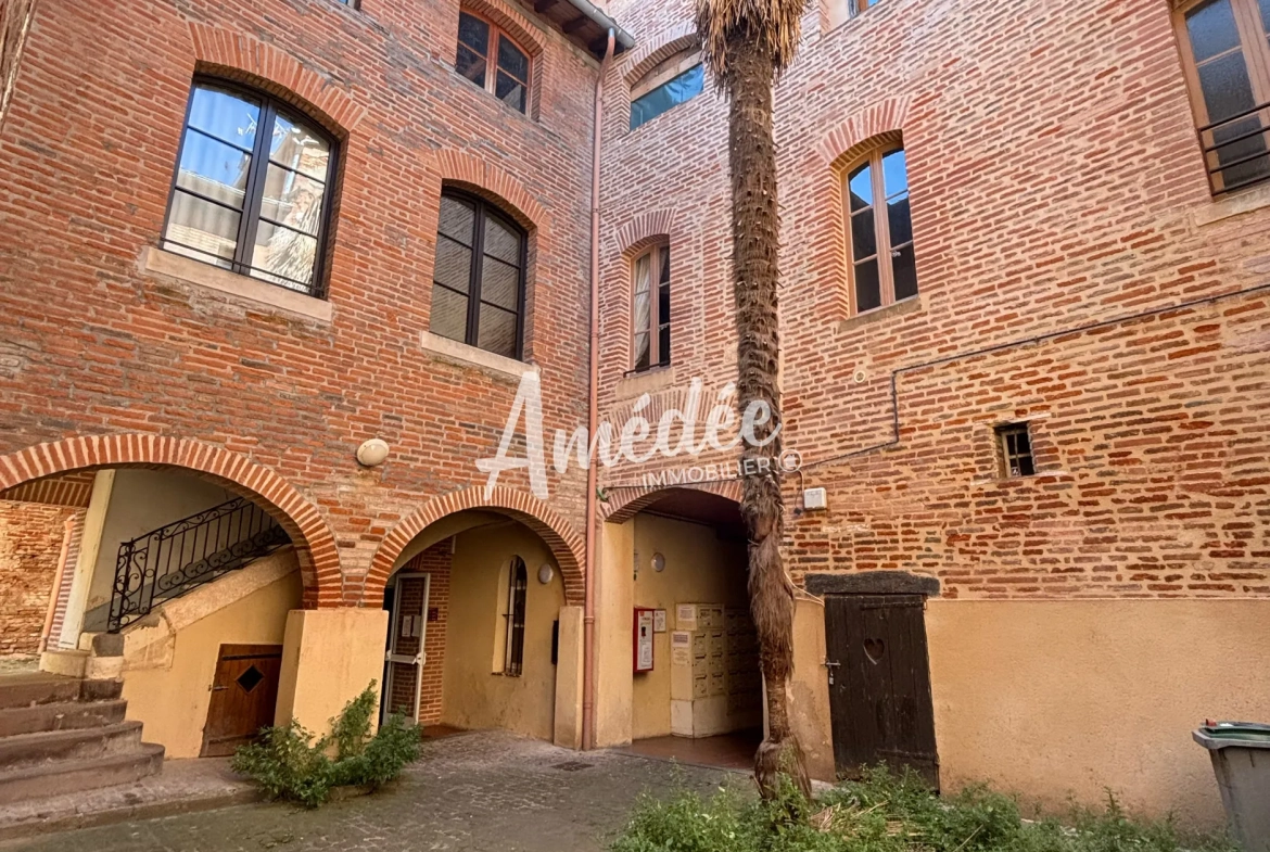 Appartement 2 pièces à vendre au centre-ville d'Albi avec charme et confort 