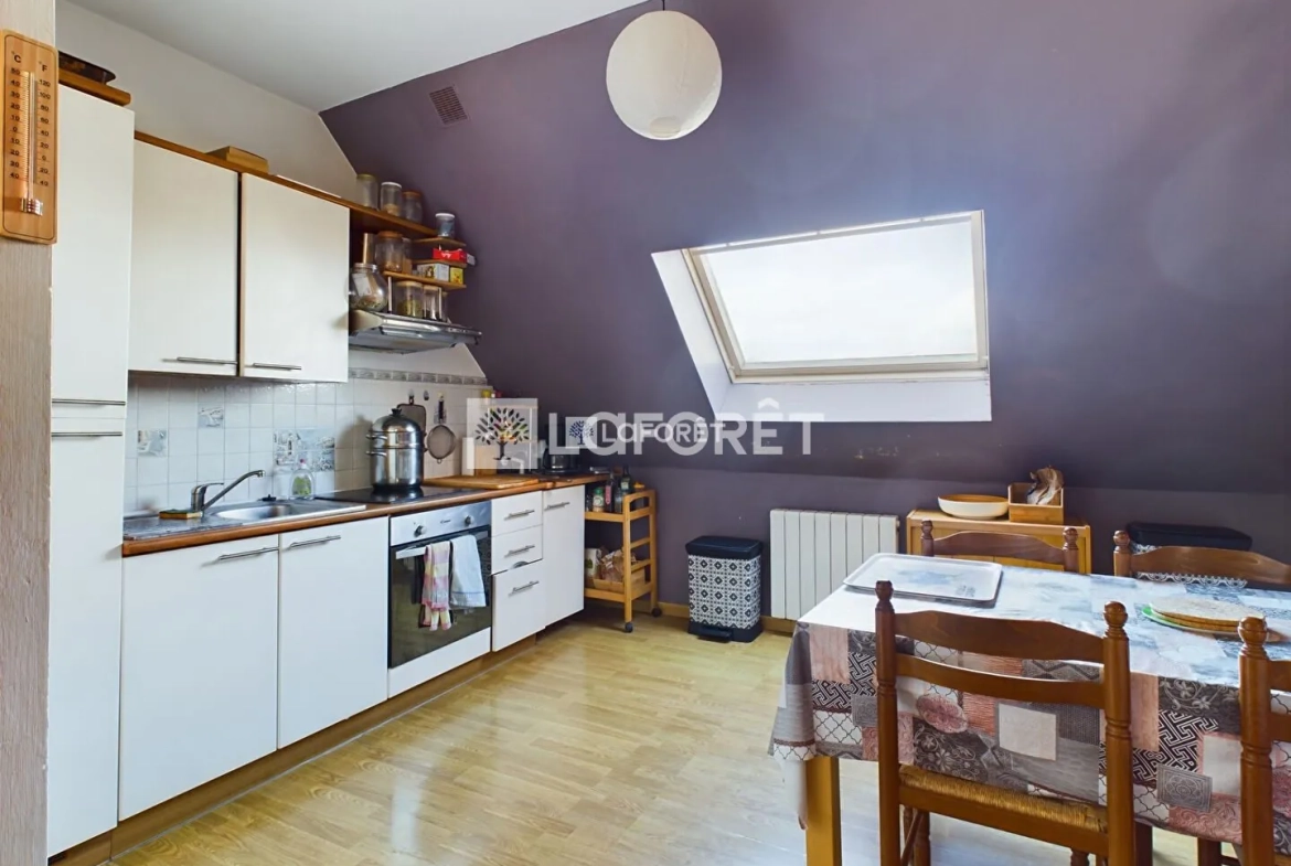 Bel appartement de style avec cachet au cœur de Pont-l'Abbé, 2 pièces, dernier étage 