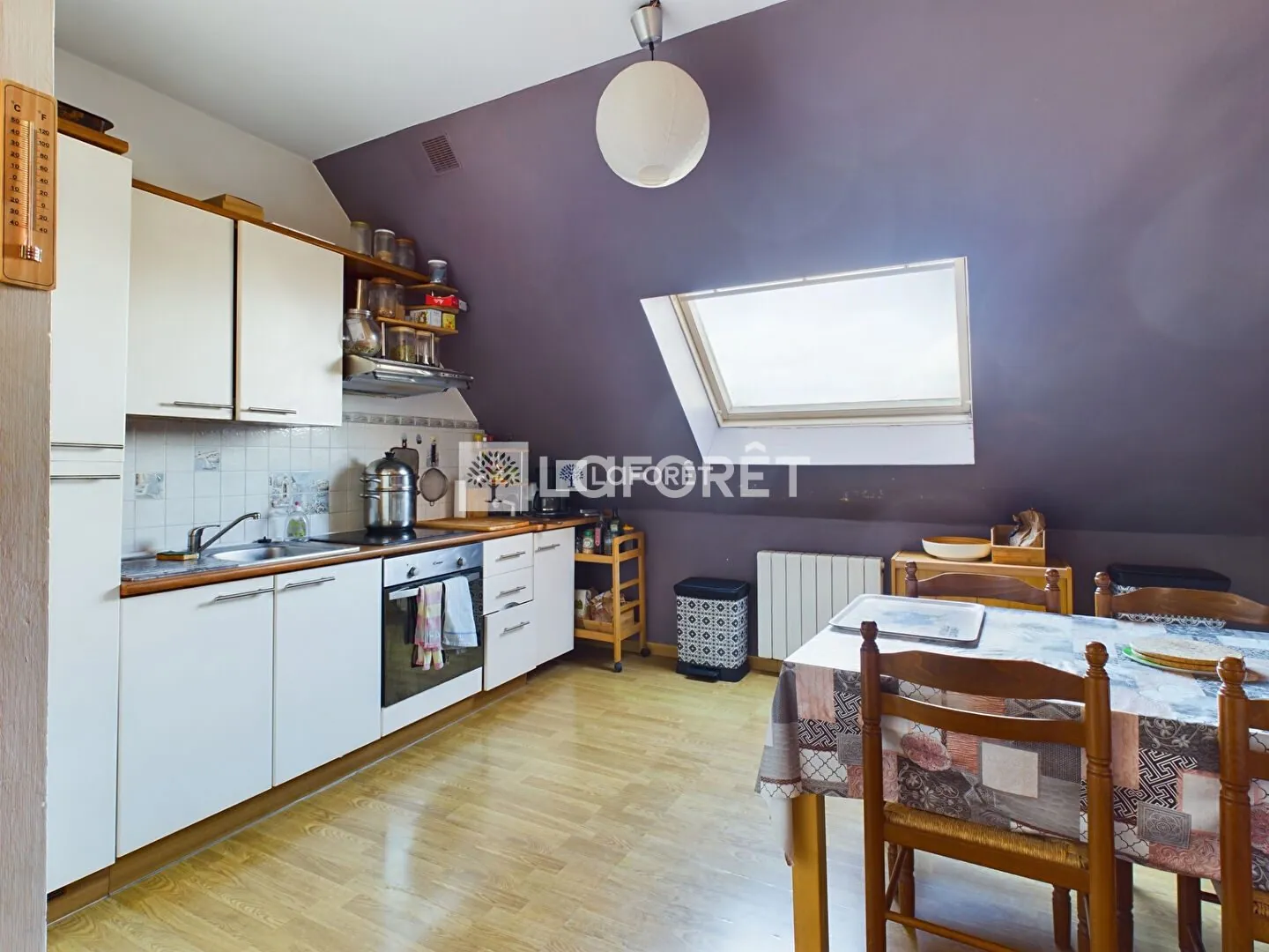 Bel appartement de style avec cachet au cœur de Pont-l'Abbé, 2 pièces, dernier étage 