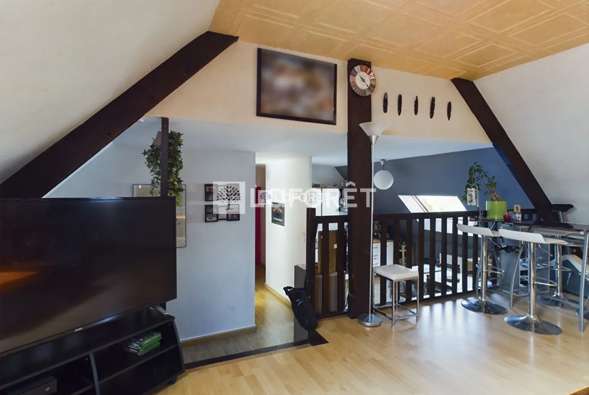 Bel appartement de style avec cachet au cœur de Pont-l'Abbé, 2 pièces, dernier étage 