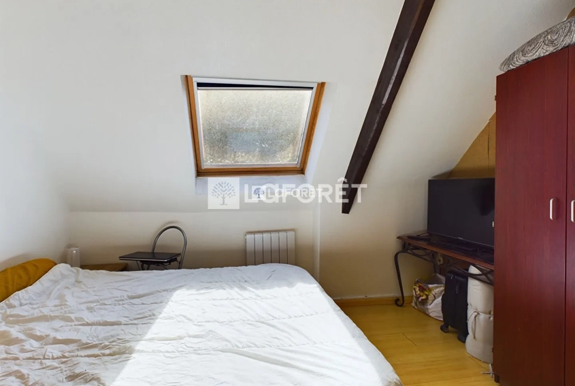 Bel appartement de style avec cachet au cœur de Pont-l'Abbé, 2 pièces, dernier étage 