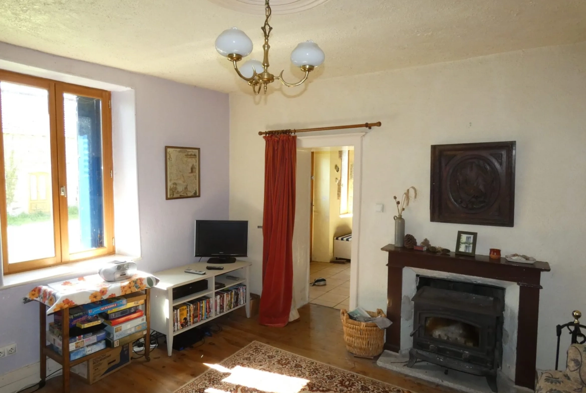 Maison en pierre à Jarnages de 123m² avec jardin et grange attenante 