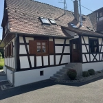 entrée Maison mitoyenne alsacienne à Hermerswiller de 88 m² avec garage et cheminée