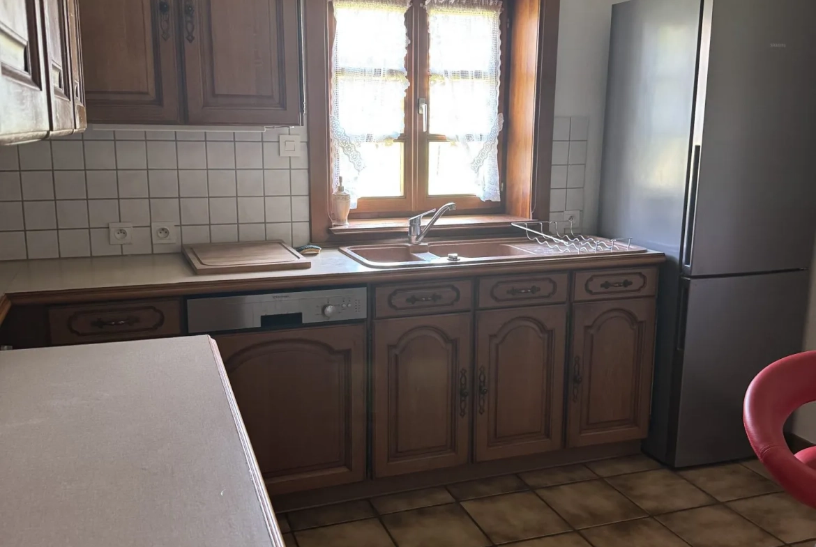 Maison mitoyenne alsacienne à Hermerswiller de 88 m² avec garage et cheminée 