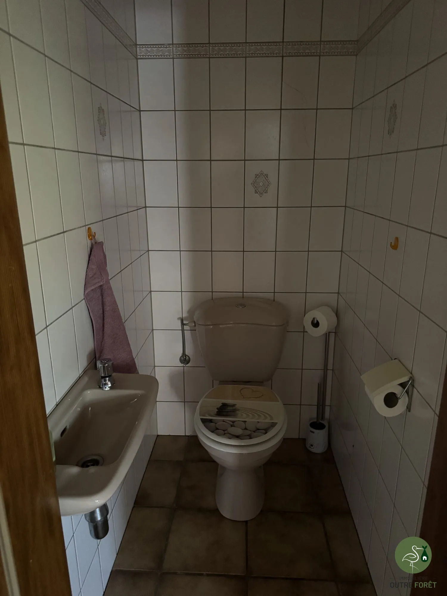 WC rdc Maison mitoyenne alsacienne à Hermerswiller de 88 m² avec garage et cheminée 