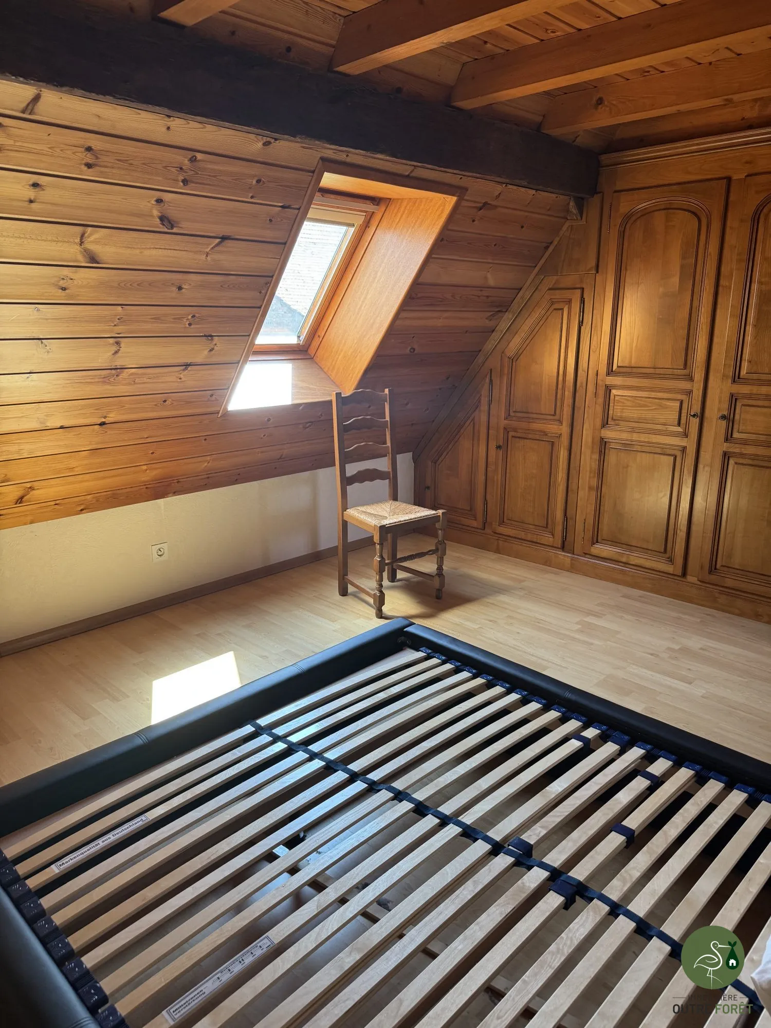 chambre parent Maison mitoyenne alsacienne à Hermerswiller de 88 m² avec garage et cheminée 