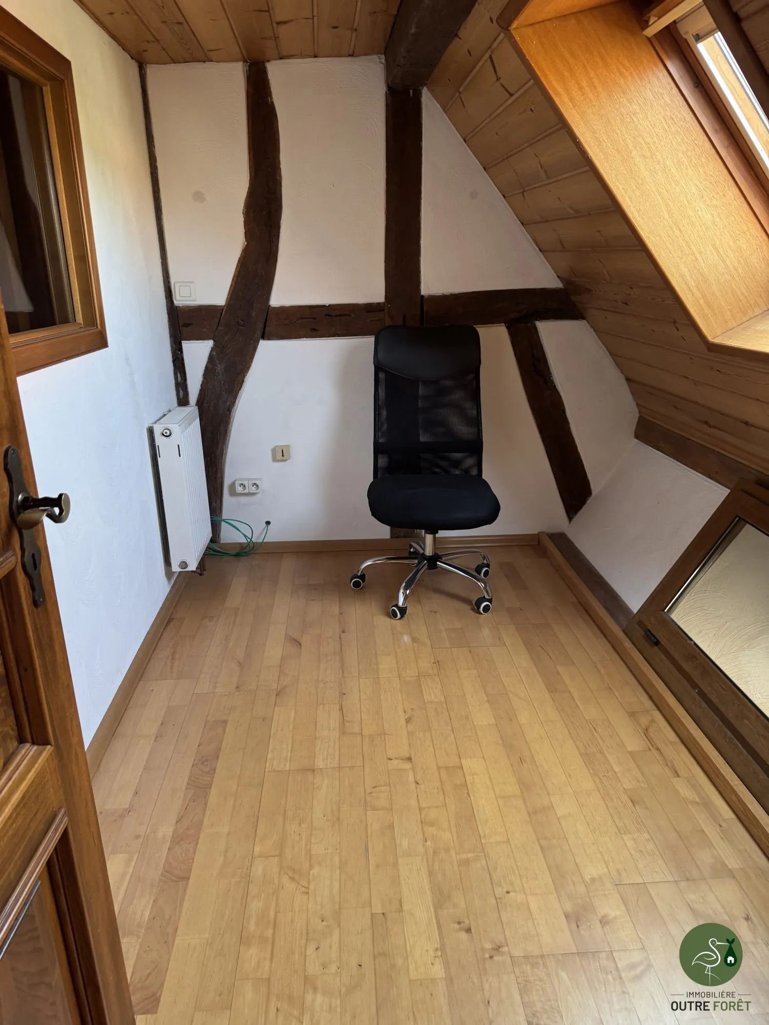 bureau Maison mitoyenne alsacienne à Hermerswiller de 88 m² avec garage et cheminée 