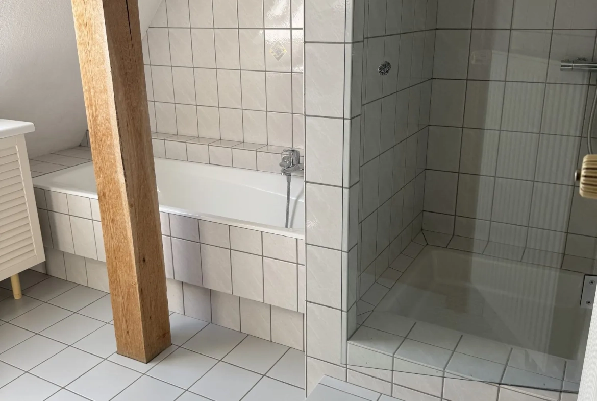Maison mitoyenne alsacienne à Hermerswiller de 88 m² avec garage et cheminée 