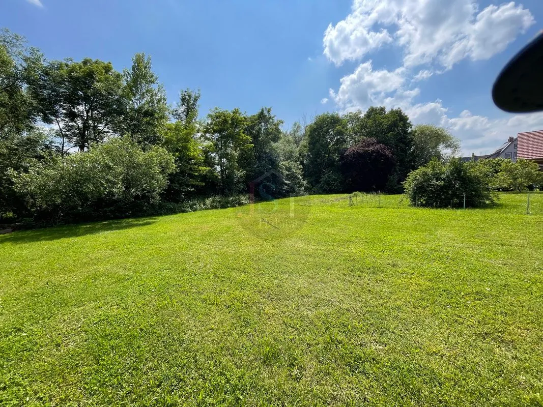 Terrain de 12,46 ares constructible à Offendorf, calme et verdoyant 