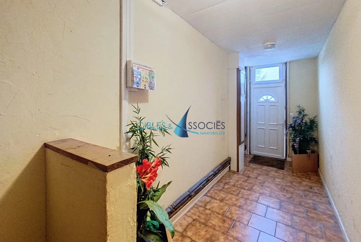 Immeuble de rapport à Sainte-Catherine de 110 m² avec potentiel locatif 