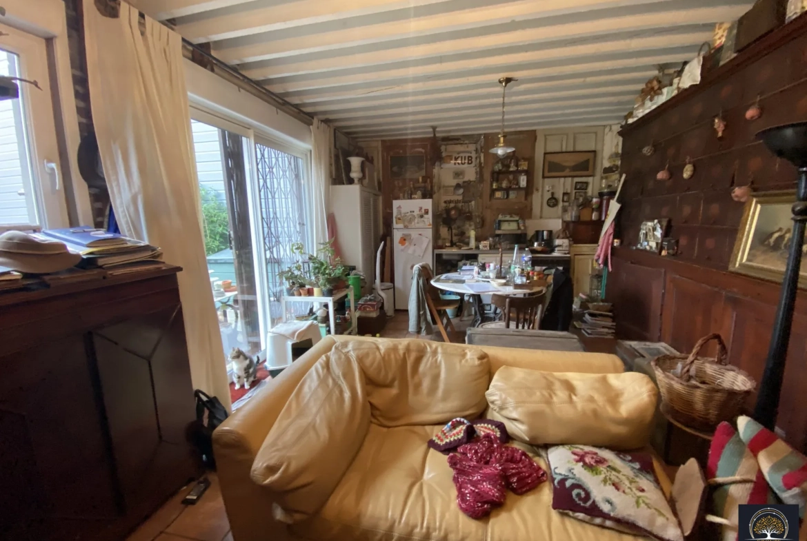 Maison atypique à vendre au centre de Saint-Laurent-Blangy avec terrasse et potentiel de rénovation 