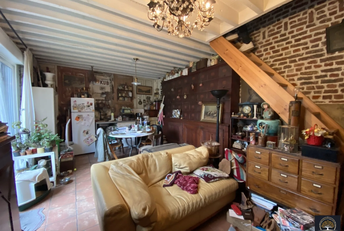 Maison atypique à vendre au centre de Saint-Laurent-Blangy avec terrasse et potentiel de rénovation 