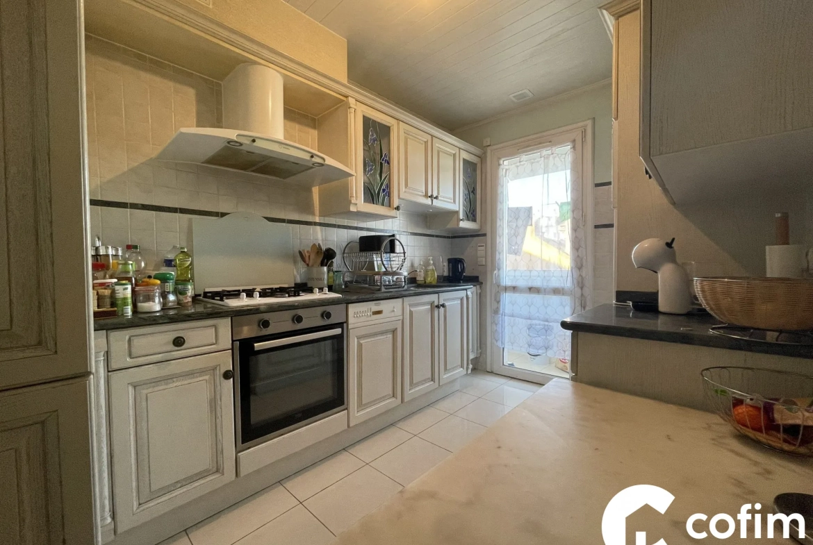 Appartement T3/T4 à vendre au cœur de Tarbes avec loggia, cave et garage sécurisé 